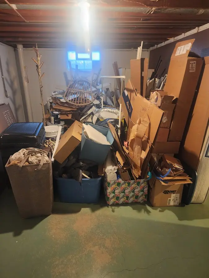 Roll-off dumpster container at job site for Cleanout Dumpster Rental in Bystrom